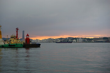Panoramic View of Moji retro town and sea from Kanmon line with sunset in Shimonoseki, Fukuoka, Kitakyushu, Japan - 北九州 下関 門司の港町
