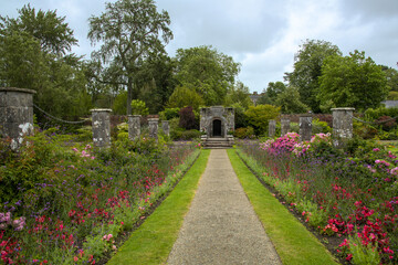 english country garden with archway
