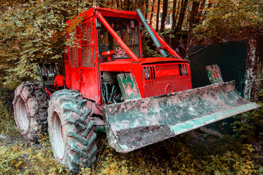 Forest tractor for logging after sawing trees, heavy forestry eq