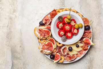 Appetizers. Bruschetta, cold cuts of prosciutto from Parma, cheese, tuna fish stuffed mini bell...