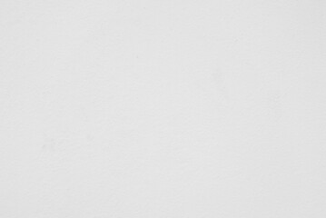 Seamless texture of white cement wall a rough surface, with space for text, for a background..