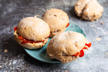 Walnut sandwich with hummus and red peppers. Vegan sandwich with hummus