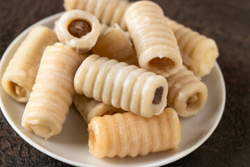 Los huesos de santo or The bones of saint are  Spanish marzipan pastry for All Saints Day.Different taste