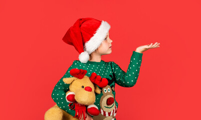 Christmas spirit. Christmas holiday cultural attributes. Reindeer and Santa Claus. Winter holiday. Seasonal discount. Small girl carry soft toy. Christmas sale. Kid reindeer gift. Happy new year