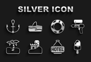 Set Sand castle, Water gun, Ice cream, Signboard with text Hotel, Tropical palm tree, Rubber swimming ring, Anchor and Shark fin ocean wave icon. Vector