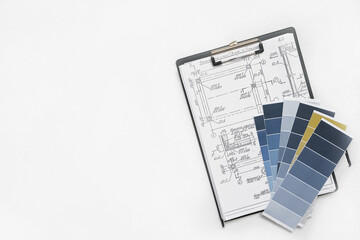 Architect works remotely from home in quarantine, lockdown covid 19 coronavirus. Remote work, stay home, new normality, social distance. Architect design working drawing sketch plans blueprints