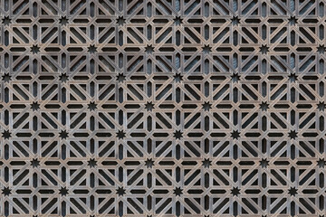 Architecture textures, detailed view of a traditional pattern moorish texture wall on exterior facade at the Mosque-Cathedral of Córdoba