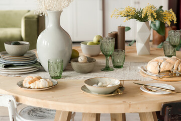 Served large table in a bright room