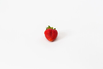 Red strawberry, arranged on a white background.