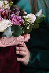 person holding a bouquet of roses