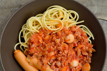 Spaghetti pasta with tomato sauce on plate,Top view