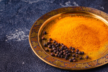 black peppers and turmeric powder