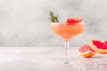 Cold lemonade/cocktail of fresh grapefruit juice.