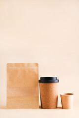 branding mockup with many craft paper and different subjects, glass for coffee, snack packaging. Contemporary workspace for men, minimalist style. Mockup. 