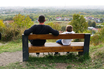 Naklejka na ściany i meble father and son enjoy the beautiful view