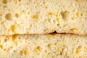 ciabatta wheat flour bread, sourdough, yeast, olive oil Italian recipe fresh portion ready to eat meal snack on the table copy space food background rustic. top view