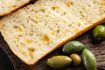 ciabatta wheat flour bread, sourdough, yeast, olive oil Italian recipe fresh portion ready to eat meal snack on the table copy space food background rustic. top view