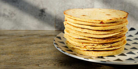 Pile of traditional Indian corn flatbreads Makki ki roti.
