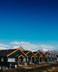 Colorful row houses with mountain backdrop in Longyearbyen, Svalbard