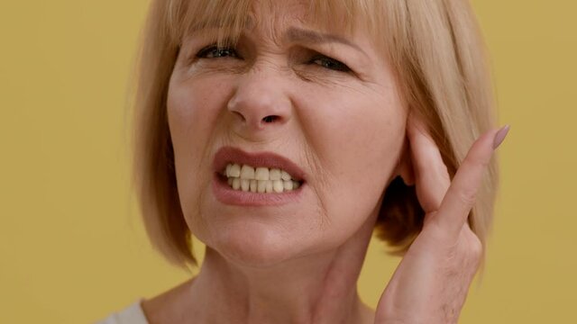 Ears Pain. Sick Senior Woman Suffering From Earache, Having Otitis Illness