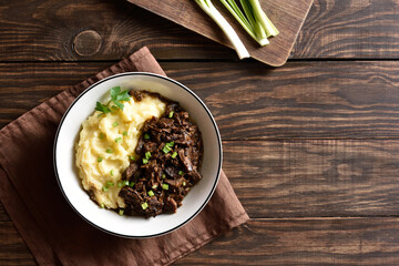 Slow cooked beef with mashed potatoes