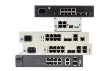 Pile of network ethernet gigabit switches isolated on white background - obrazy, fototapety, plakaty