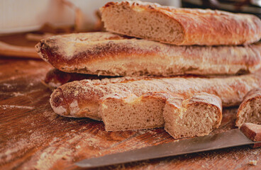 Homemade craft sourdough bread, Crusty Artisan Bread. Freshly baked bread baguettes at home