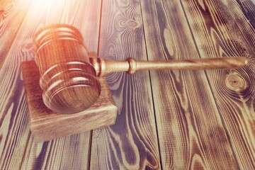 Judge's wooden gavel on the desk. Law concept