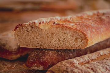Homemade craft sourdough bread, Crusty Artisan Bread. Freshly baked bread baguettes at home