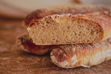 Homemade craft sourdough bread, Crusty Artisan Bread. Freshly baked bread baguettes at home