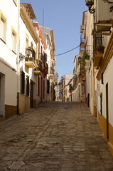 Rhonda. Andalusia. Spain. Empty street, traditional white houses, medieval buildings.