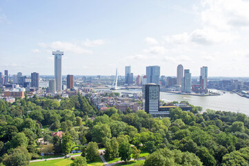 Obraz premium Aerial view of the Rotterdam skyline with a city park in the foreground in the Netherlands