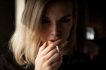 Young Woman Smoking Cigarette