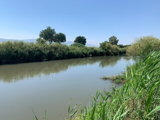 Fototapeta na wymiar Clear day on the Jordan River