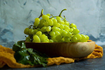 green grapes on concrete background
