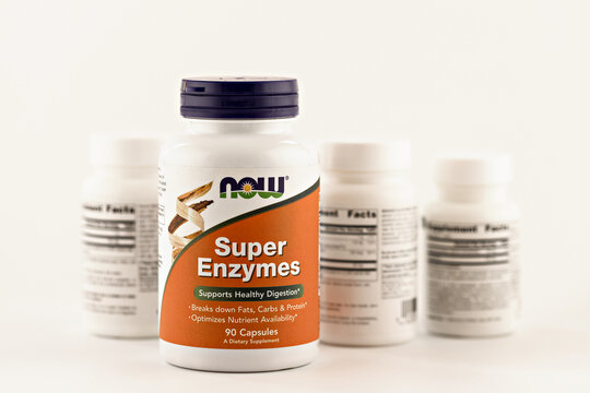 super enzymes capsules in the jar. dietary supplement editorial photo