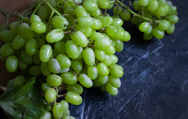 green grapes on concrete background
