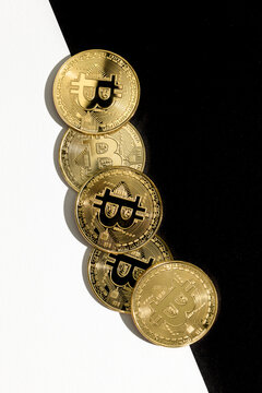 Bitcoins on black and white