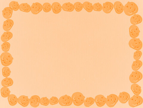 Orange paper texture with many pumpkin. Halloween border. with place for your text. 