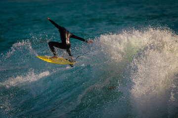 2021-10-04 SURFER RIDING A LARGE WAVE IN LA JOLLA CALIFORNIA