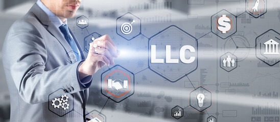 Limited Liability Company concept. Businessman touched LLC