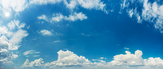 Deep blue sky and different types of white clouds in it. Beautiful nature background.