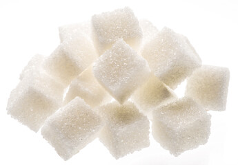 White sugar cubes on white background. Macro picture.