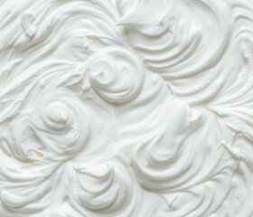 Creamy pics in yoghurt or cream surface. Top view.