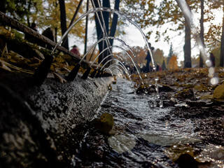 Spray from the fountain. Water jet	