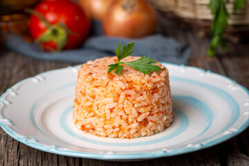 Traditional delicious Turkish food; rice pilaf with tomatoes (Turkish name; Domatesli pirinc pilavi)