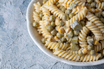 Pasta salad with mayonnaise and vegetables