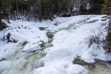 Fototapeta na wymiar Chutes de Plaisance, QC, Canada in Winter