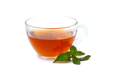 Transparent cup of tea with mint leaf isolated on white background