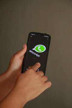 salvador, bahia, brazil - october 5, 2021: person trying to access whatsapp app on a smartphone.